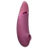 Womanizer Next - vibrator za klitoris z zračnimi valovi - roza - akumulatorski