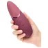 Womanizer Next - vibrator za klitoris z zračnimi valovi - roza - akumulatorski